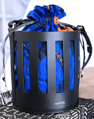 Sac seau Huguette Hibiscus – Cuir ajouré & wax – Édition limitée – Porto