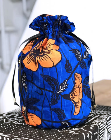Sac seau Huguette Hibiscus – Cuir ajouré & wax – Édition limitée – Porto